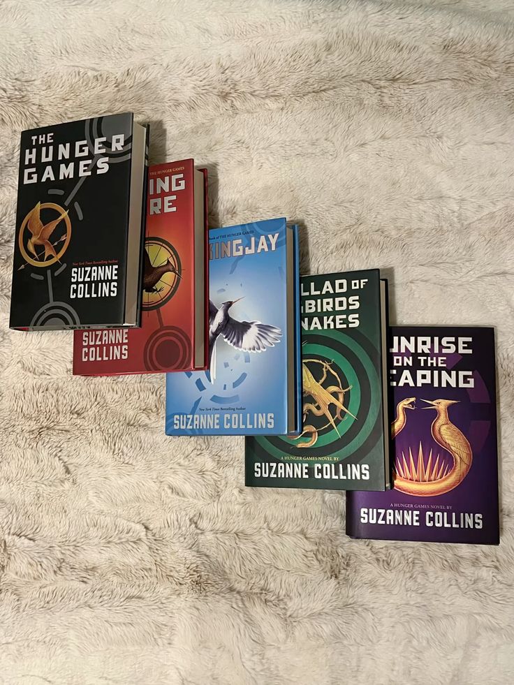 The Hunger Games = Catching Fire = Mockingjay = The Ballad of Songbirds and Snakes = Sunrise on the Reaping