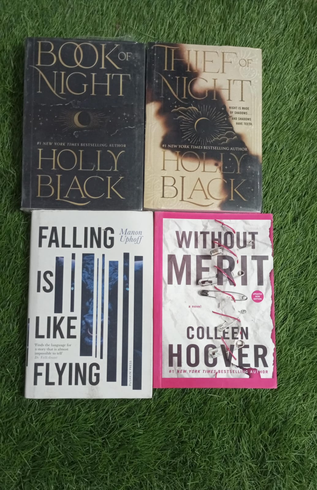 Four-book bundle: Book of Night and Thief of Night by Holly Black, Falling Is Like Flying by Manon Uphoff, and Without Merit by Colleen Hoover