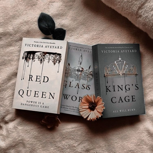 Hard covers RED QUEEN=GLASS WOR=KING’S CAGE