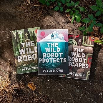 The Wild Robot + The Wild Robot Escapes +  The Wild Robot Protects by Peter Brown