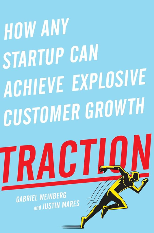 Blue cover of Traction by Gabriel Weinberg and Justin Mares